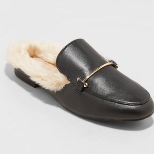 New Women’s Rebe Faux Fur Mules. Black with gold finished bar across the upper.
